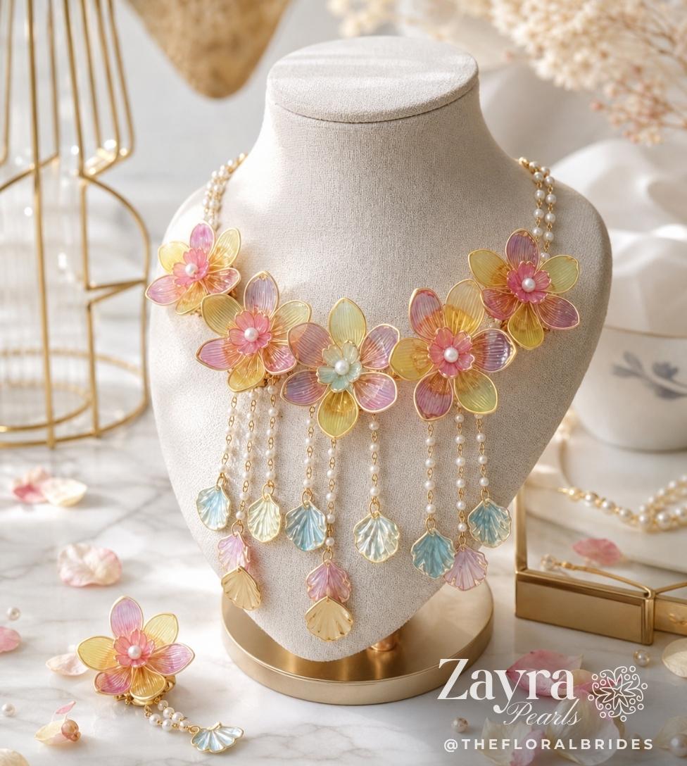 HALDI MEHNDI BRIDAL SET floral necklace on a mannequin bust with 'Zayra Pearls' branding.