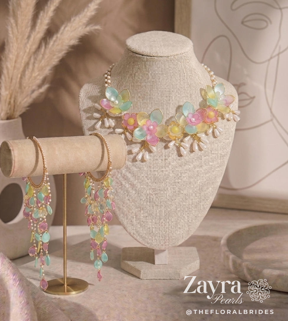 Zayra Pearls Pastel Bloom premium Handcrafted floral mehndi jewellery for brides by Zayra Pearlsbridal jewellery set featuring translucent mint, pink, and yellow resin flower petals with delicate pearl strings, displayed haldi mehendi bridal jewellery