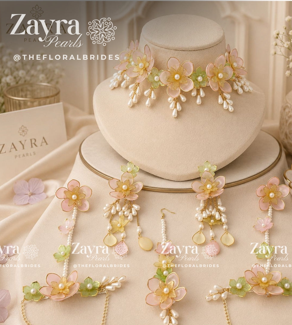 Handcrafted 3-color Aura Bloom Haldi Jewellery Set with pastel pink 2  necklace earrings hathphool and maangtikka by Zayra Pearls.