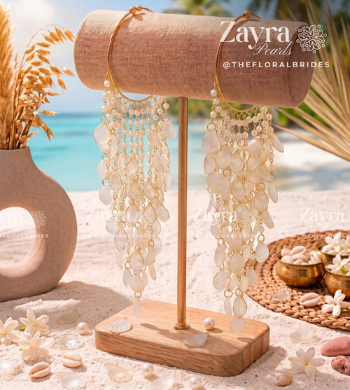 Handcrafted bridal haldi mehndi white pastel kalire featuring cascading pearls and white resin petals by Zayra Pearls
