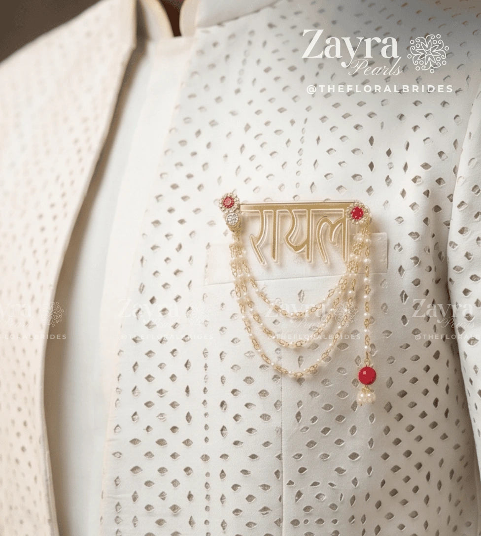 A gold-toned Indian 'Raj' (royal) nameplate brooch by zayra Pearls
