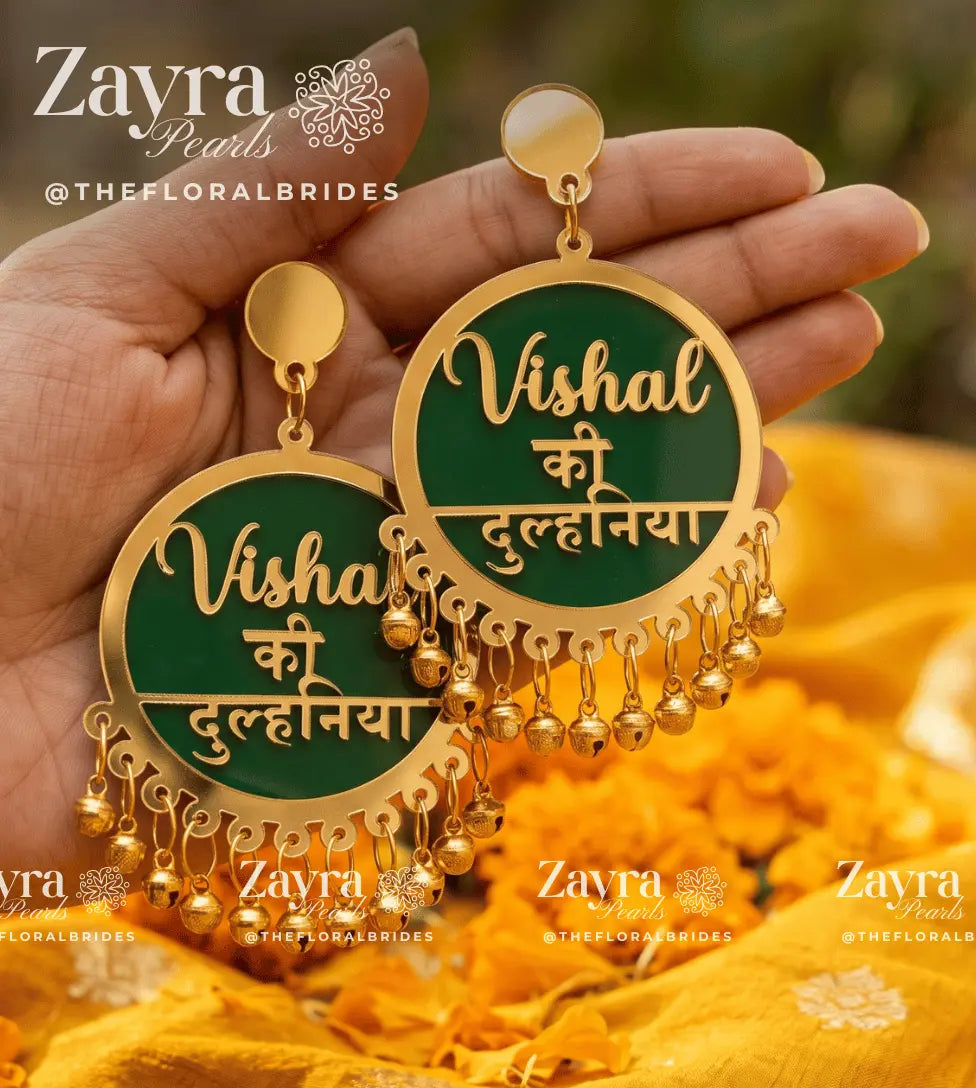 Bridal custom dulhaniya earrings paired with a yellow pre-wedding haldi outfit.
