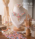 Handcrafted Sky Blush bridal set for haldi pastel look with pink and blue necklace earrings hathphool maangtikka and kaleere by Zayra Pearls.