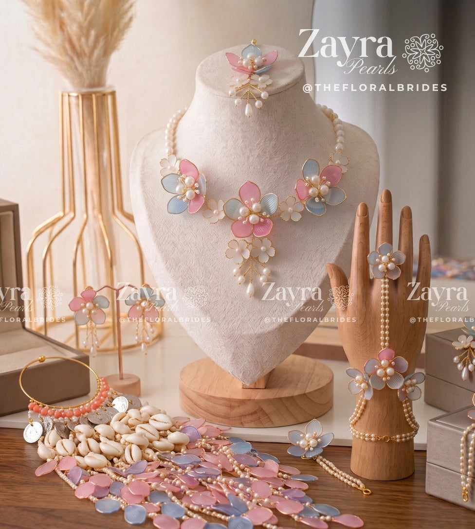 Handcrafted Sky Blush bridal set for haldi pastel look with pink and blue necklace earrings hathphool maangtikka and kaleere by Zayra Pearls.