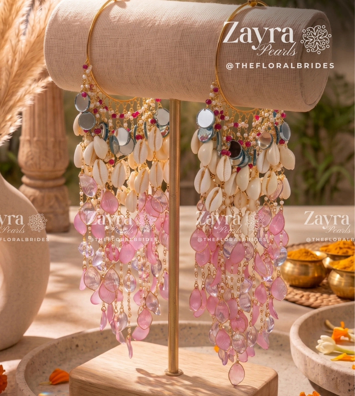 Handcrafted trending haldi carnival kaleere with circular mirrors, cowrie shells, and lilac resin petals by Zayra Pearls.