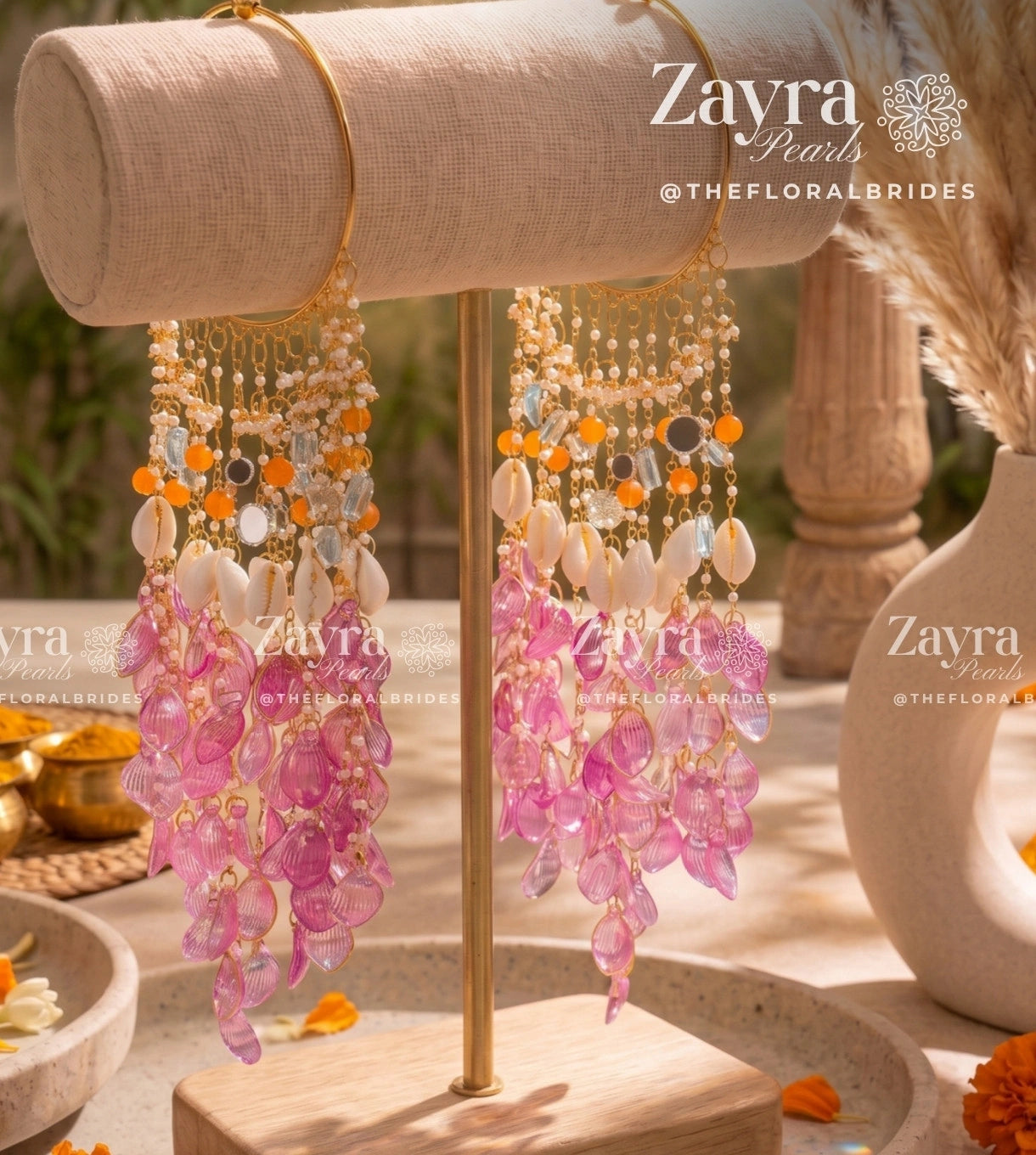 Handcrafted trending haldi mehendi carnival kaleere with circular mirrors, cowrie shells, and lilac resin petals by Zayra Pearls.